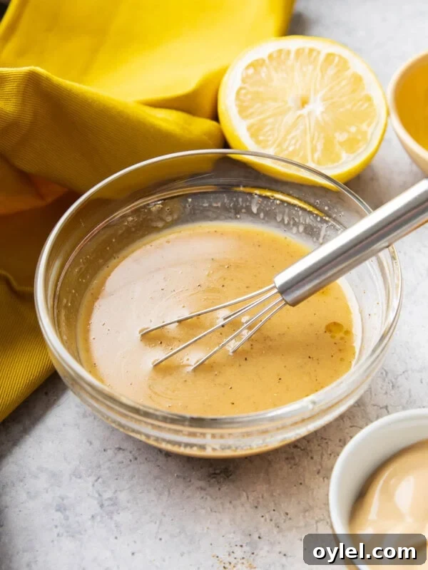 Maple Vinaigrette Recipe for Salads 8 A bowl of the best Honey Mustard dressing recipe shows the tangy and sweet texture that’s perfect for salads and dips