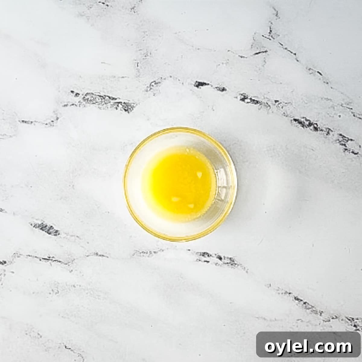 melted butter in glass bowl.