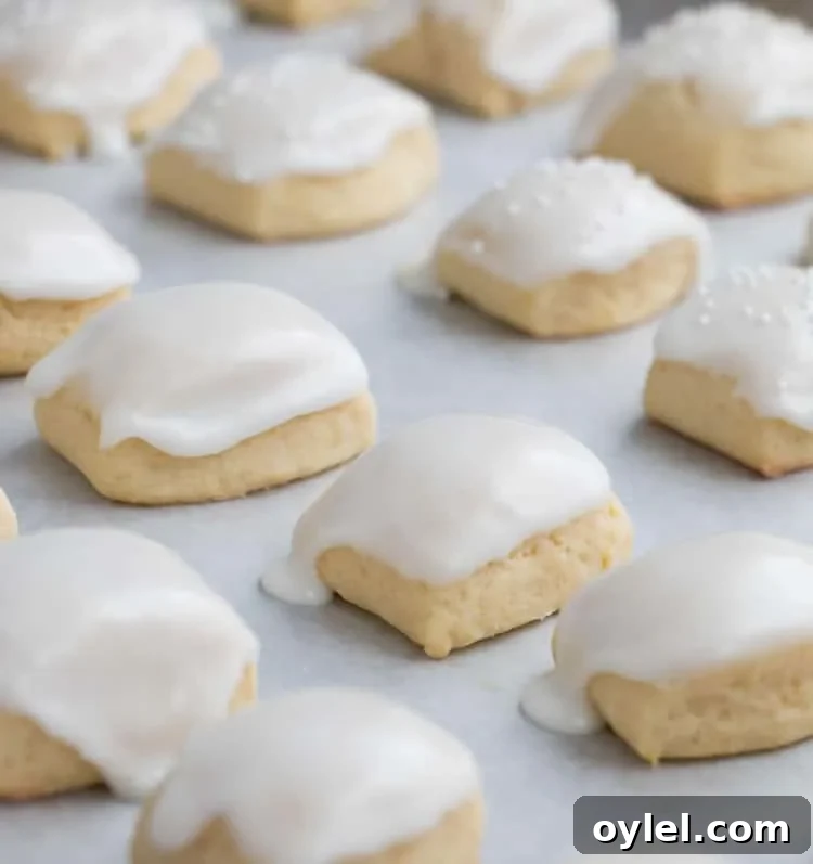 Iced Lemon Pillow Cookies Recipe with Zesty Glaze 4 Iced Lemon Pillow Cookies. A soft, petite, pillow shaped cookie, flavored with fresh lemon zest and then coated in fresh lemon icing. A perfect tea cookie!
