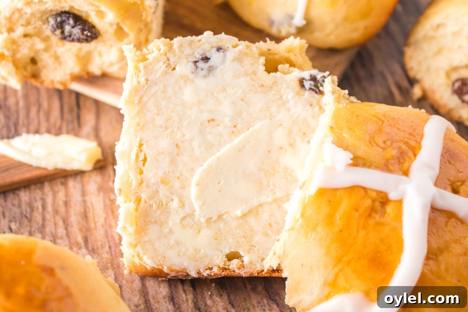Homemade Hot Cross Buns Recipe for Easter 2 Buttered Hot Cross Bun with Glazed Cross.
