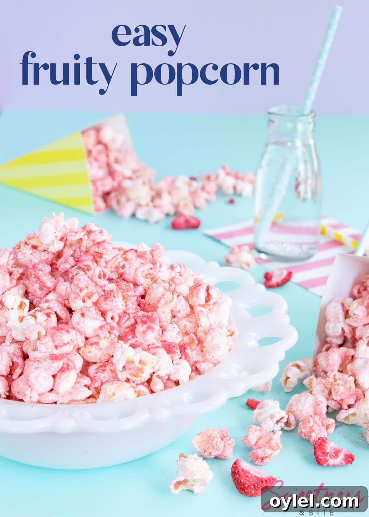 White bowl of pink fruit-flavoured popcorn
