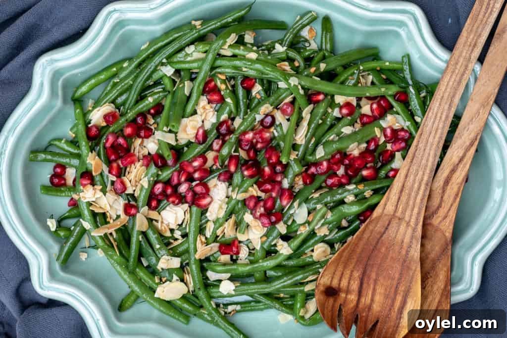 Green beans almondine with pomegranate seeds