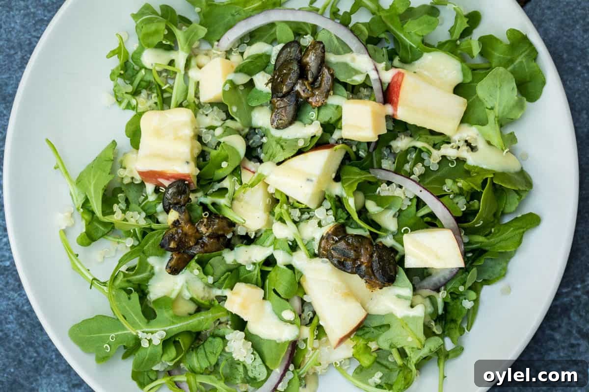 Arugula salad with apples and quinoa