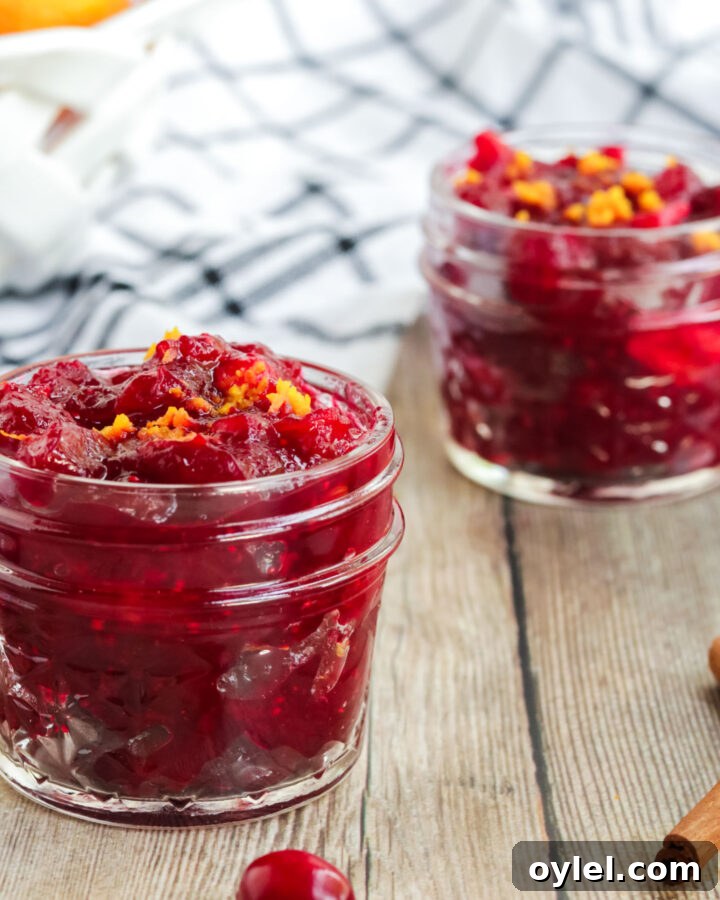 Cranberry Orange Sauce, Cranberry Sauce in a little glass jar with orange zest on top