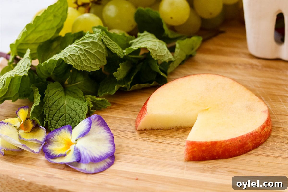 Apple cut to make bug fruit kabobs for kids.