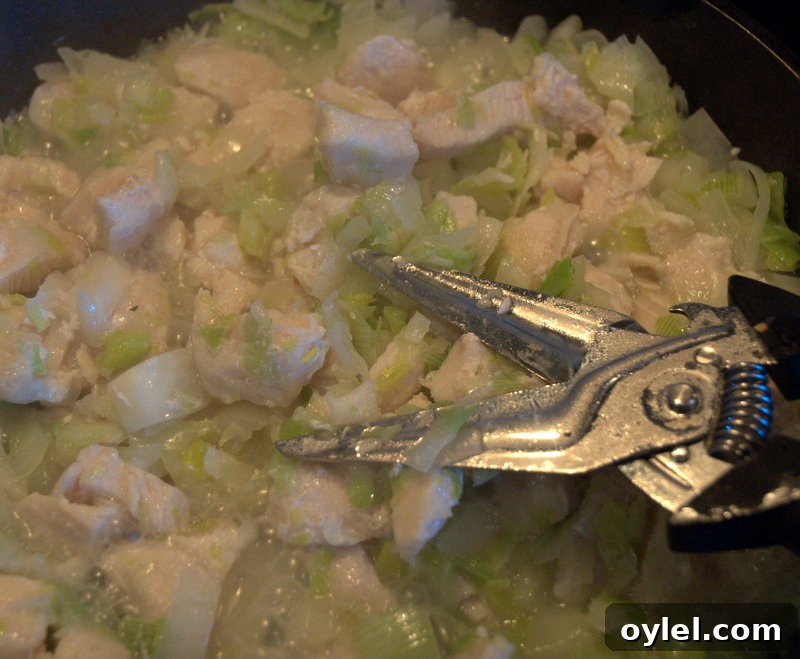 cutting up cooked chicken cutting up cooked chicken for white chili