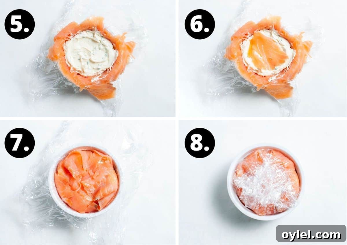 Smoked Salmon Puff Pastry Parcels 6 The final four steps in this recipe - adding the filling to the ramekin, topping with more smoked salmon, folding the salmon over and folding the cling film over.