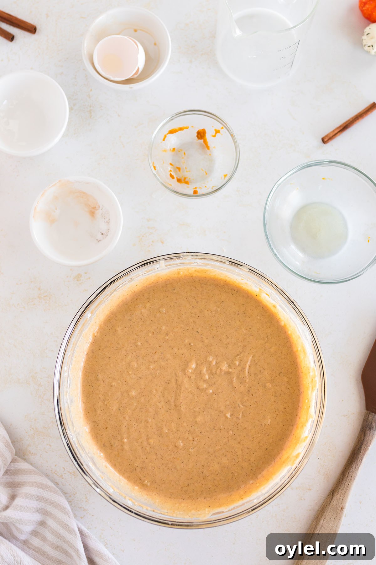 Pumpkin pancake batter in a mixing bowl.