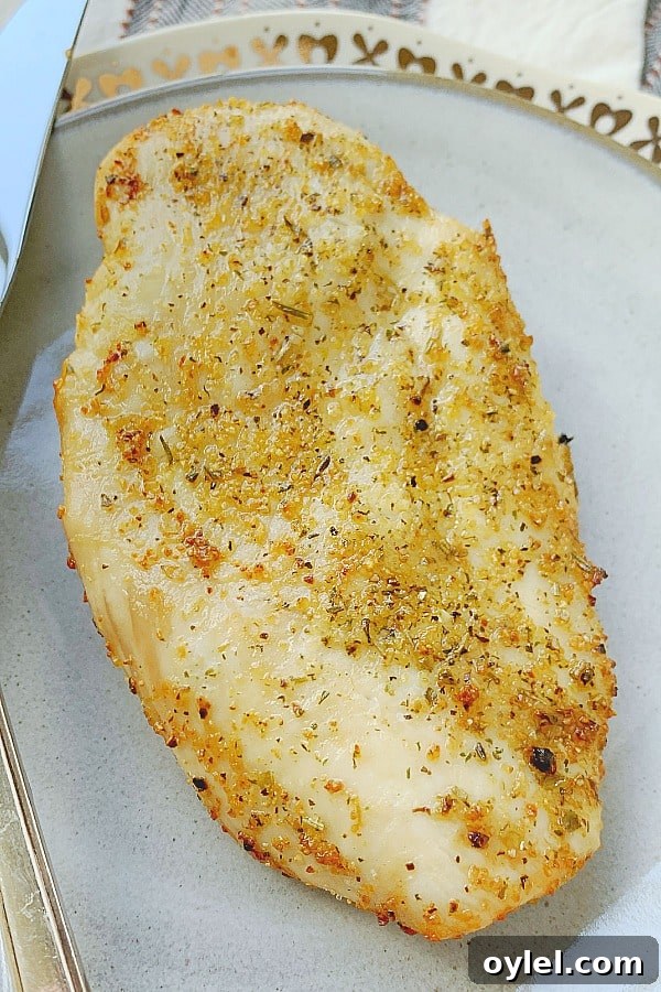 Crispy, Juicy Air Fryer Chicken Breasts in 15 Minutes 5 air fryer chicken breast on a plate