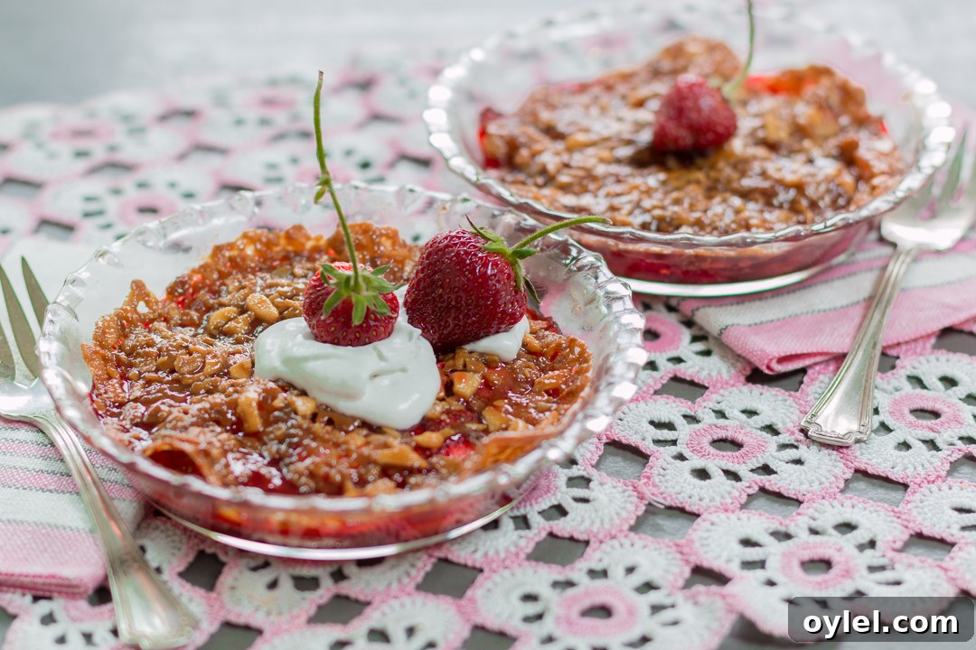 20 Spring Recipes to Brighten Your Table 11 Genius Strawberry Lace-Cookie Crisp in individual pie pans