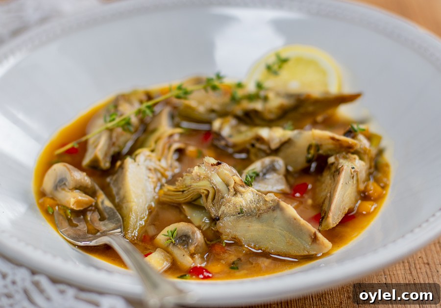 20 Spring Recipes to Brighten Your Table 8 Artichokes à la Grecque in a white bowl