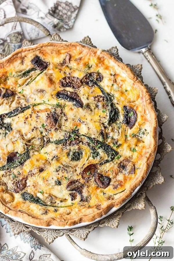 Enjoy this spinach and mushroom quiche as a quick breakfast or for brunch. This vegetarian quiche is packed with protein and vegetables. Also low carb and keto.