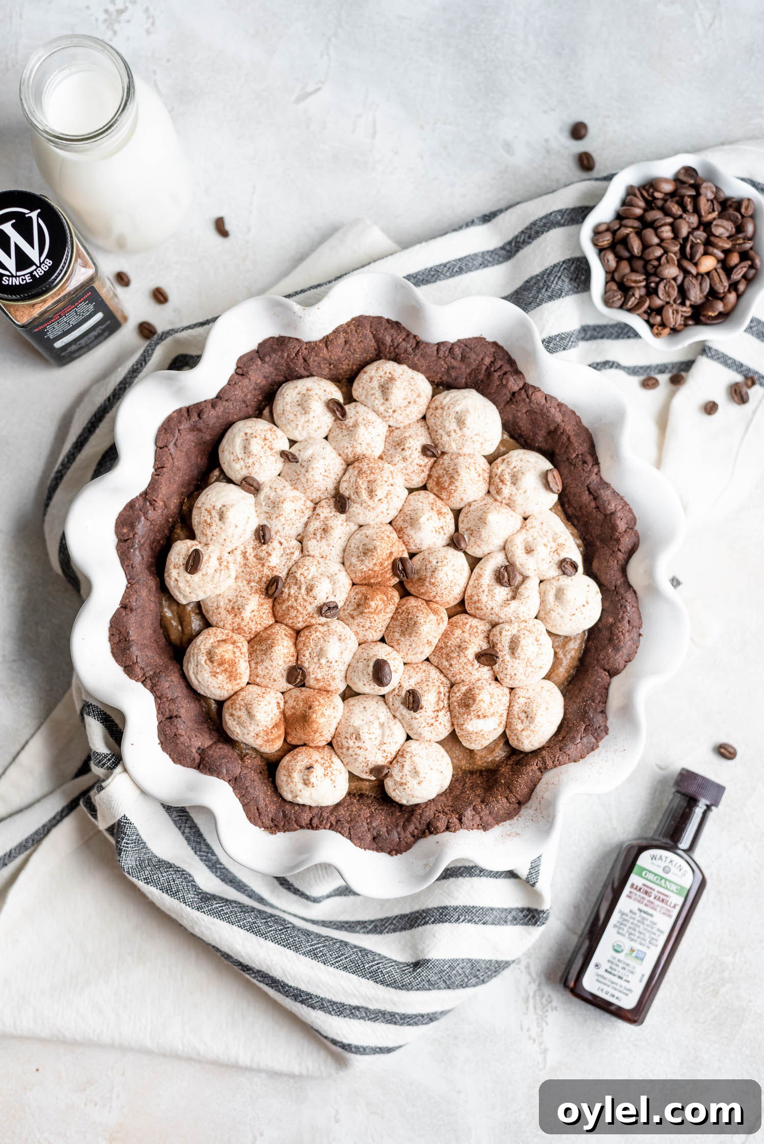 pie in pan surrounded by ingredients