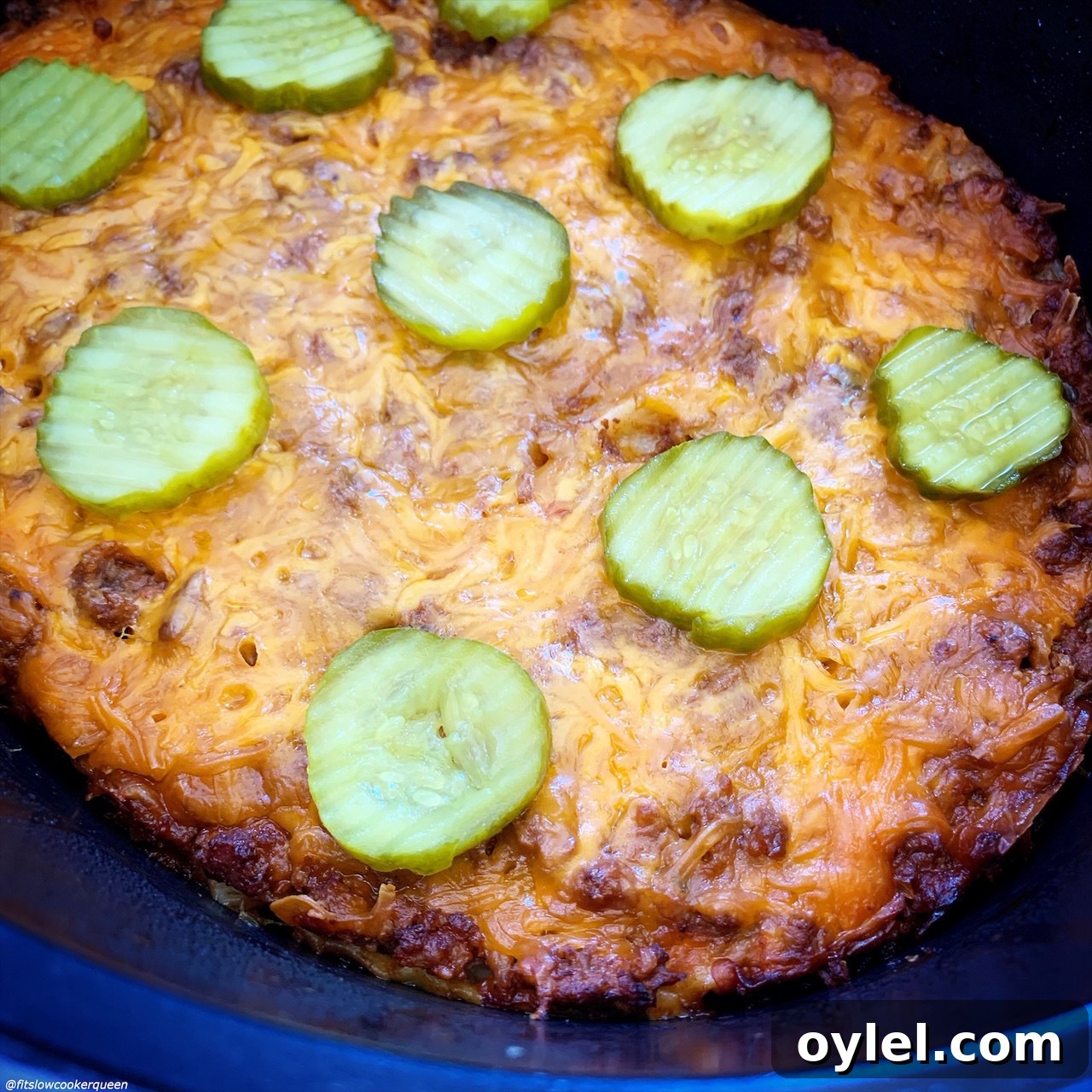 close up pic of {VIDEO} Slow Cooker Cheeseburger Casserole (Low-Carb) with pickles