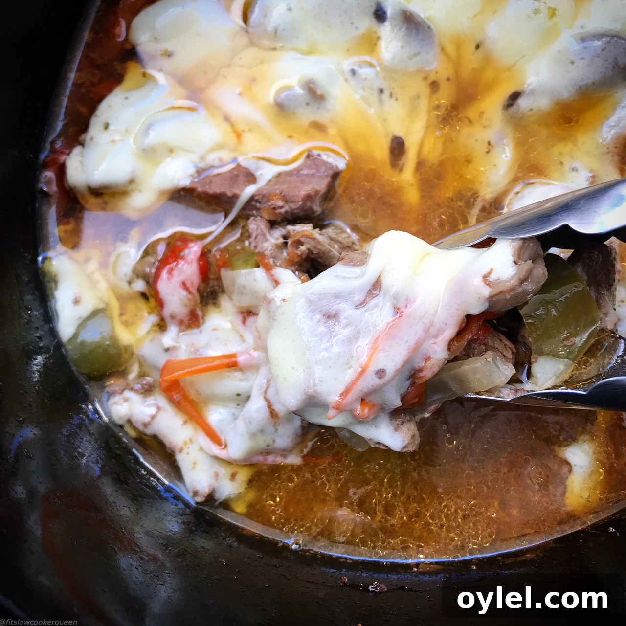 These low carb philly cheesesteaks can't get any easier. Everything, including the cheese, cooks together for a simple slow cooker recipe.