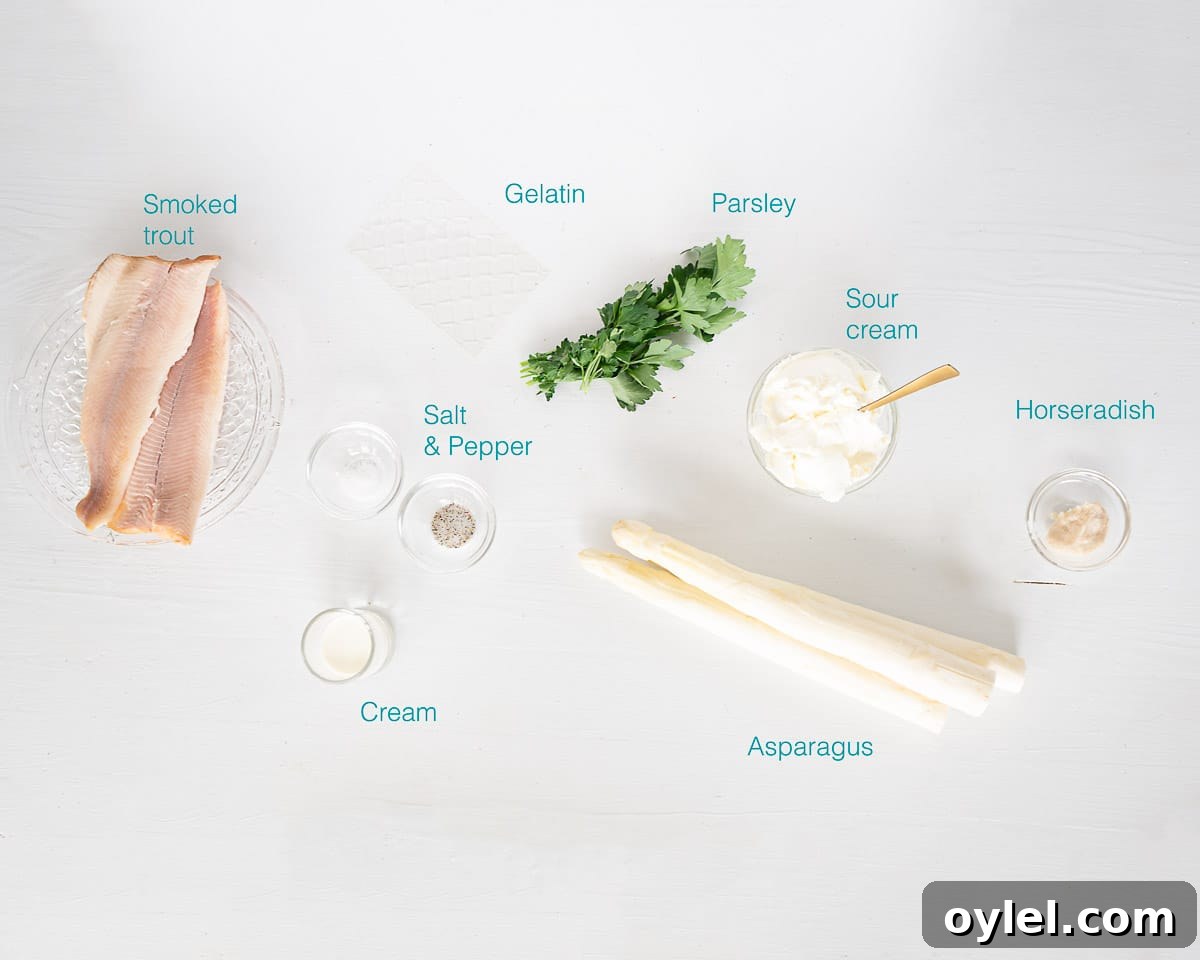 Ingredients amuse bouche asparagus mousse with smoked trout on a white background with text description