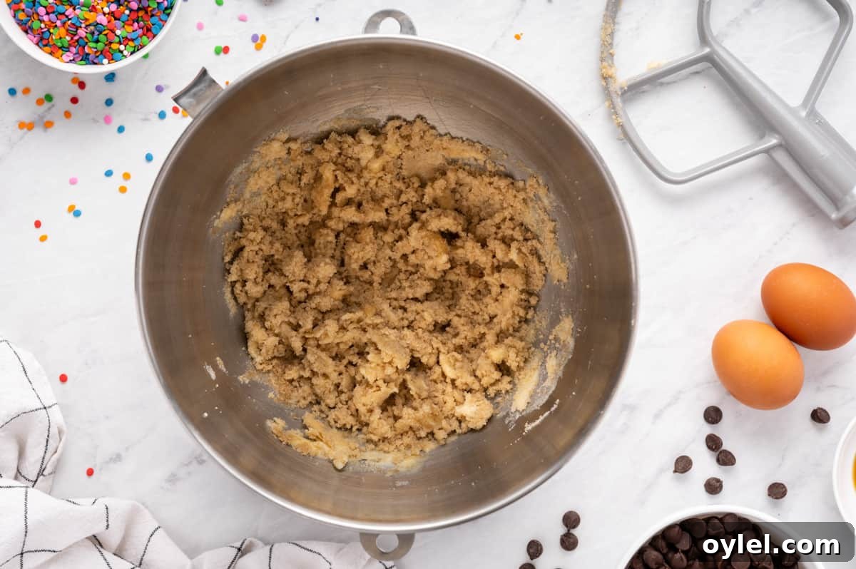 How to Make a Chocolate Chip Cookie Cake 17 creamed butter and sugars in a metal bowl