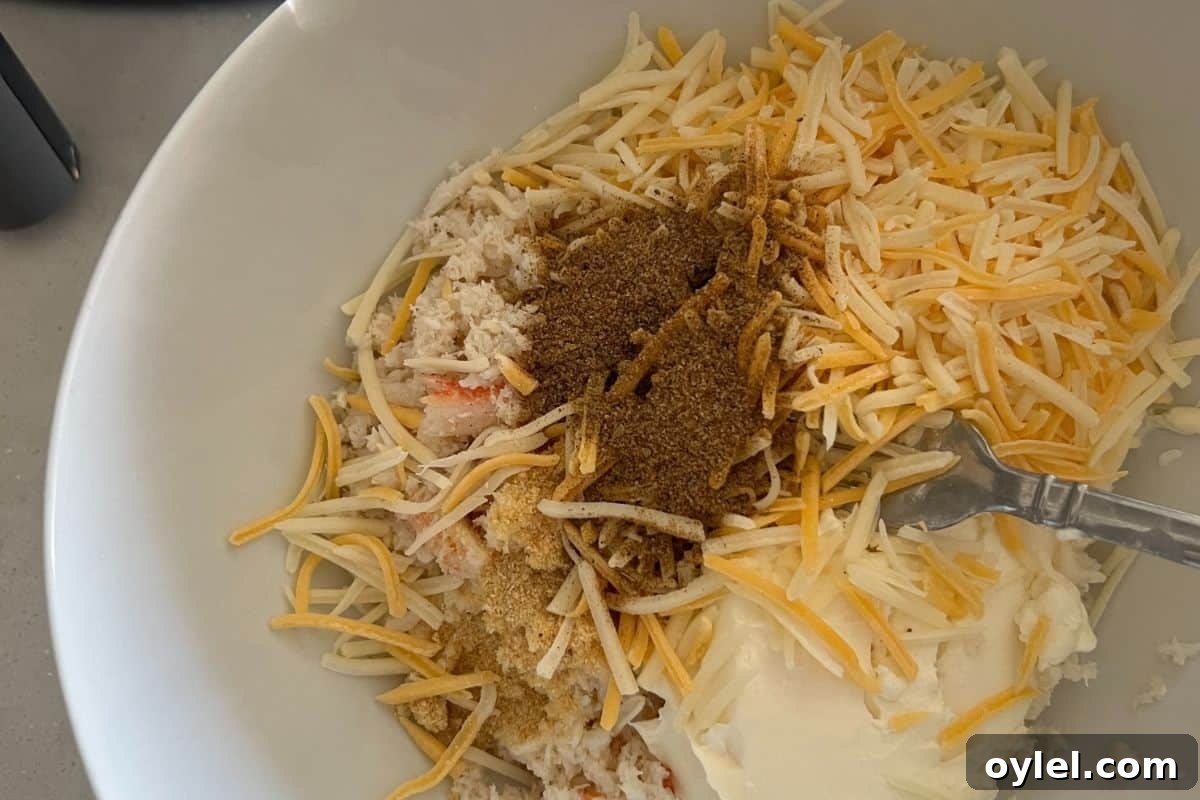 Crab ingredients mixed together in a bowl.