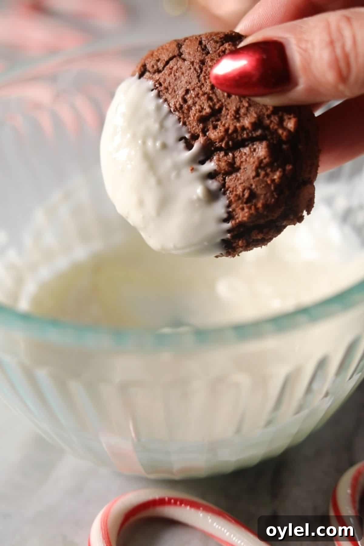 Peppermint bark cookies dipped in white chocolate.