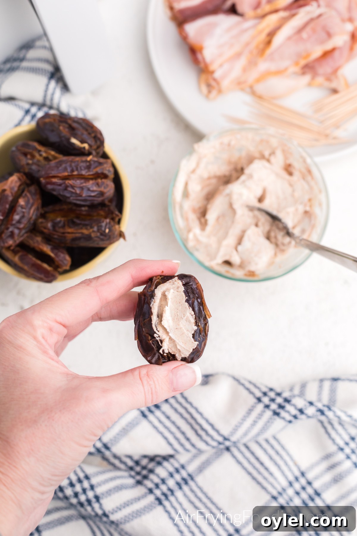 Air Fryer Bacon-Wrapped Dates Recipe 6 Cream cheese mixture scooped into the pitted date.