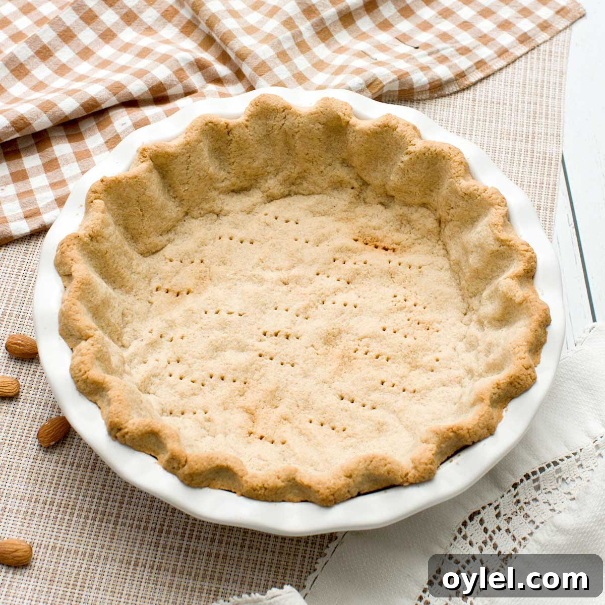 Gluten Free Cassava Flour Chocolate Chip Cookies Recipe 12 A gluten-free almond flour pie crust in a pie plate.