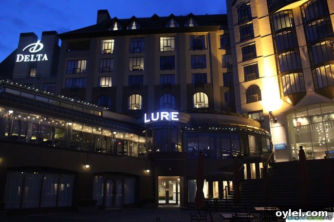 Lure Restaurant lit up at night, in Victoria British Columbia, Canada.