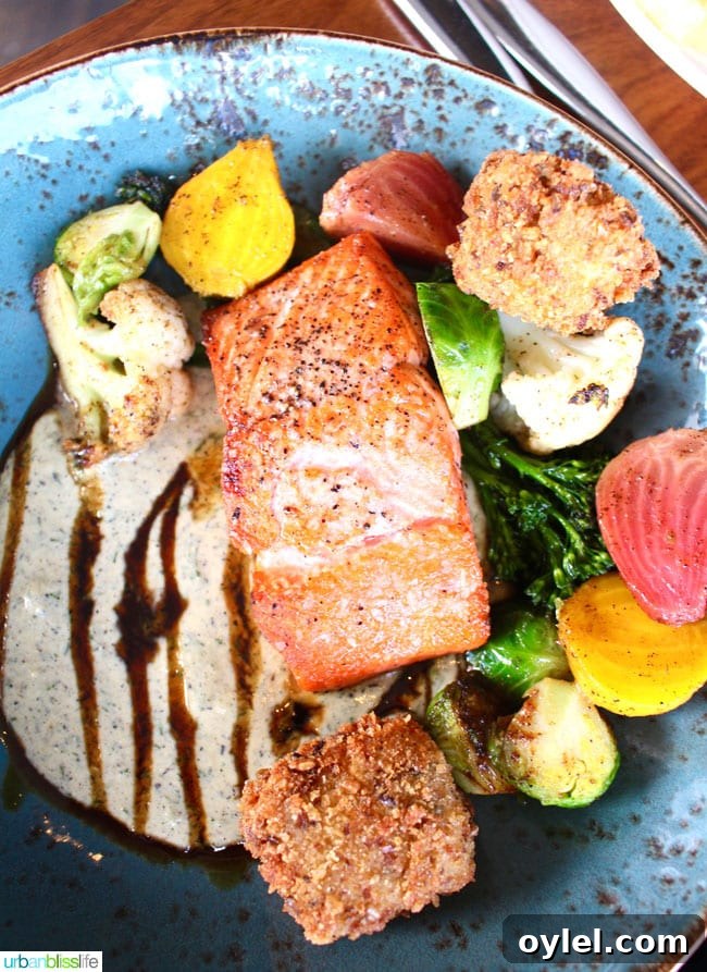 salmon with vegetables at Lure Restaurant in Victoria British Columbia, Canada.