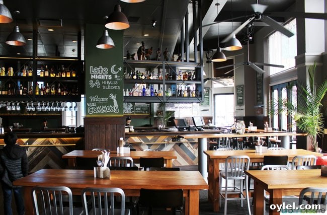 restaurant seating and bar area at 10 Acres Commons restaurant in Victoria BC Canada.