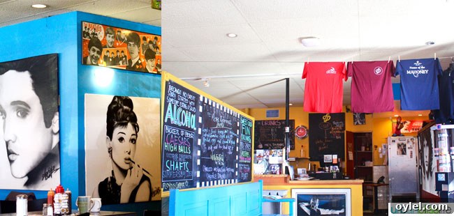 colorful interior with posters on walls at Floyd's Diner in Victoria British Columbia, Canada.