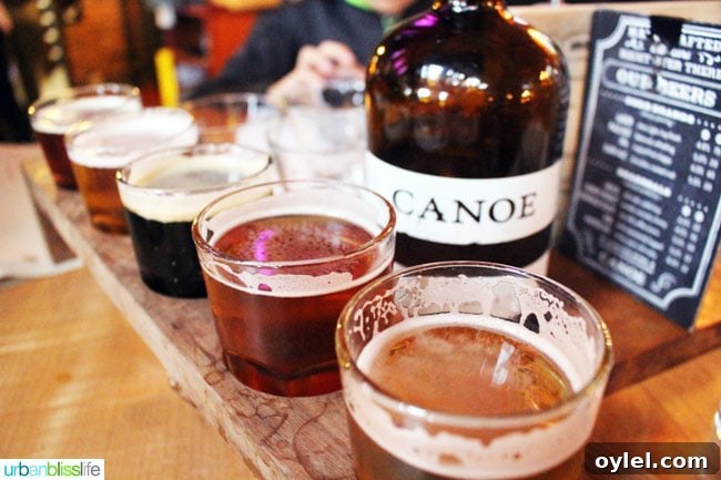 beer sampler tray at Canoe Brewery in Victoria British Columbia, Canada.