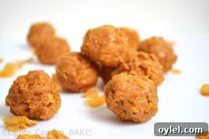 Homemade Peanut Butter Clusters Recipe 2 Peanut Butter Clusters - a quick no-bake snack made with peanut butter, icing sugar, maple syrup and cornflakes.