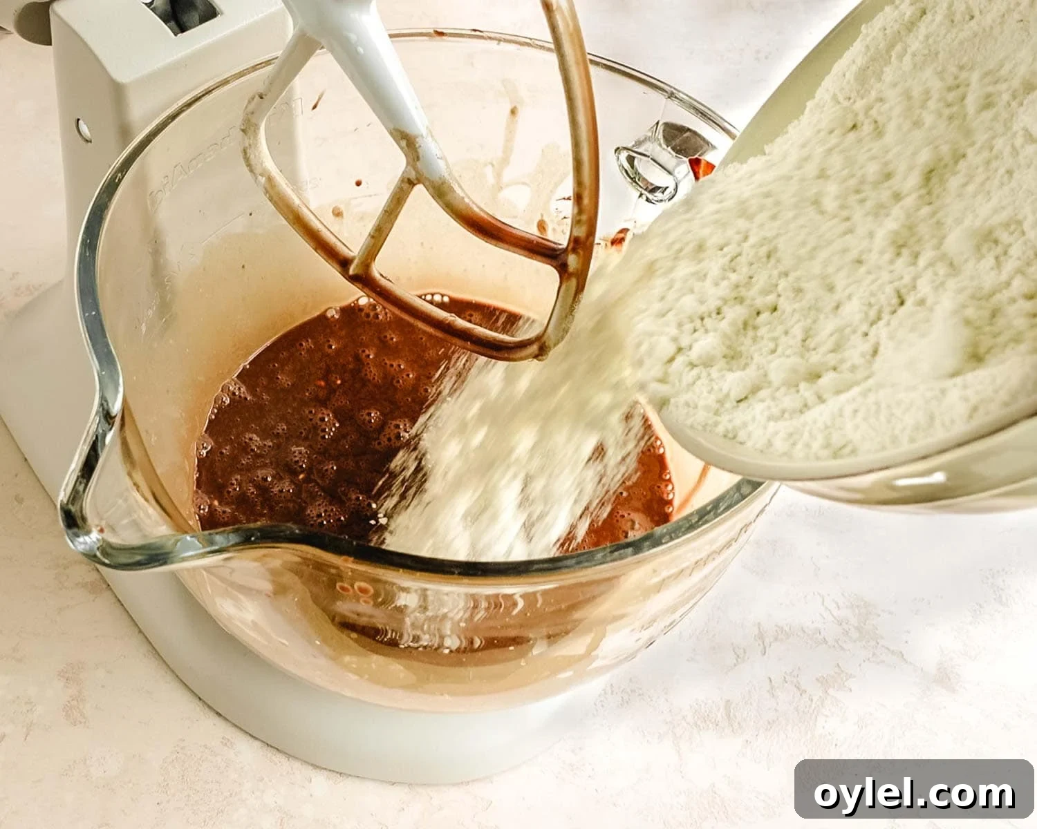 Add flour mixture to the wet ingredients.