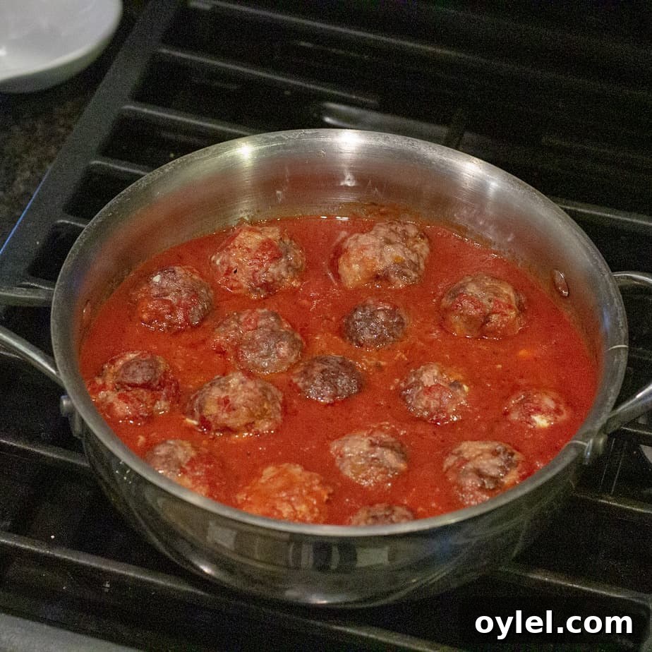 Smoked Meatball Sub Recipe: Smoky Italian Sandwich 5 homemade Italian meatballs simmering in marinara