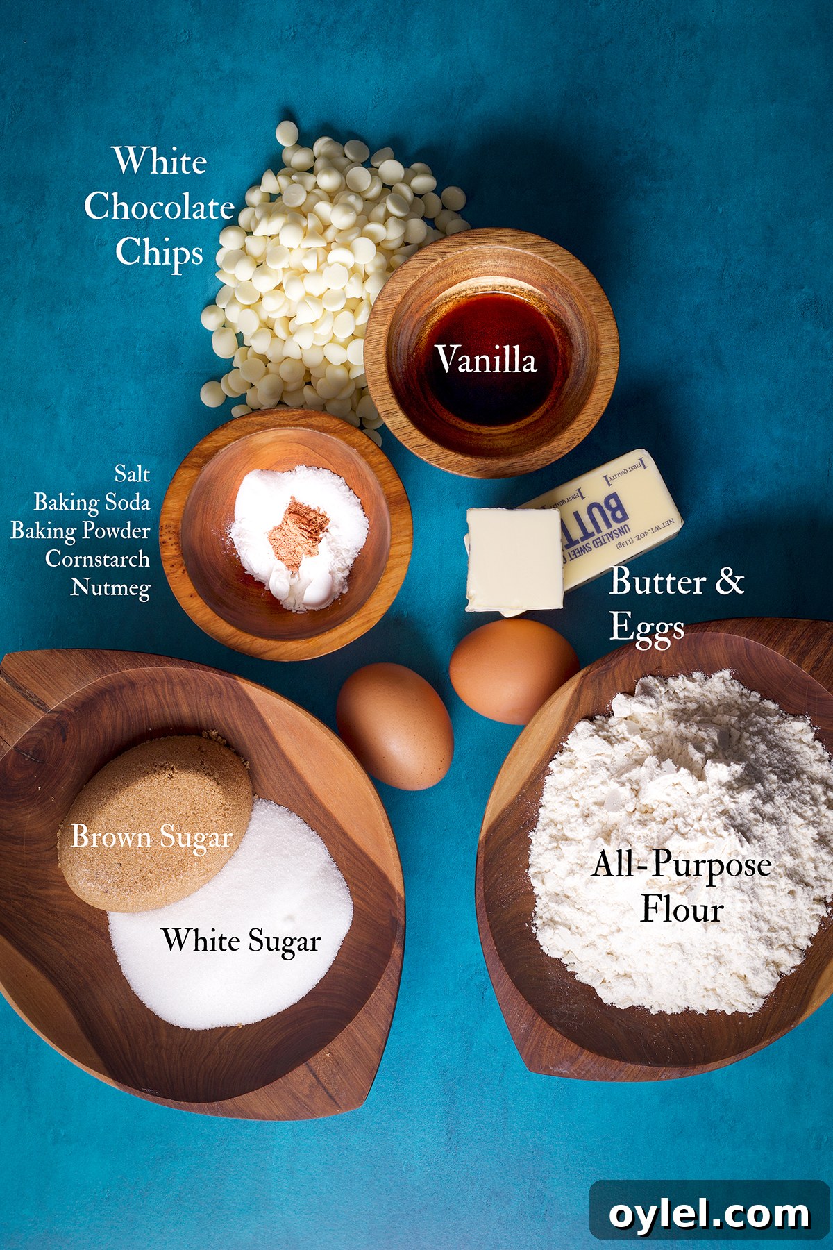All the ingredients needed to make white chocolate chip cookies.