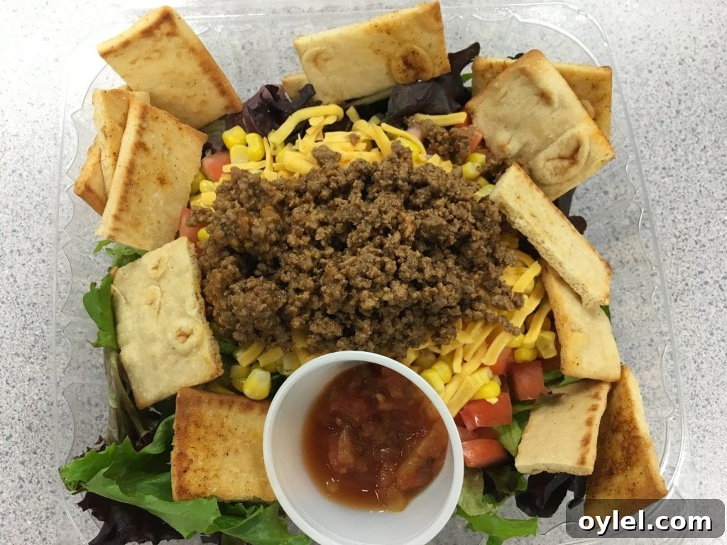 5-Day Chilled Salad Meal Plan for Workweek Lunches 3 Taco salad with seasoned ground beef, lettuce, tomatoes, and cheese
