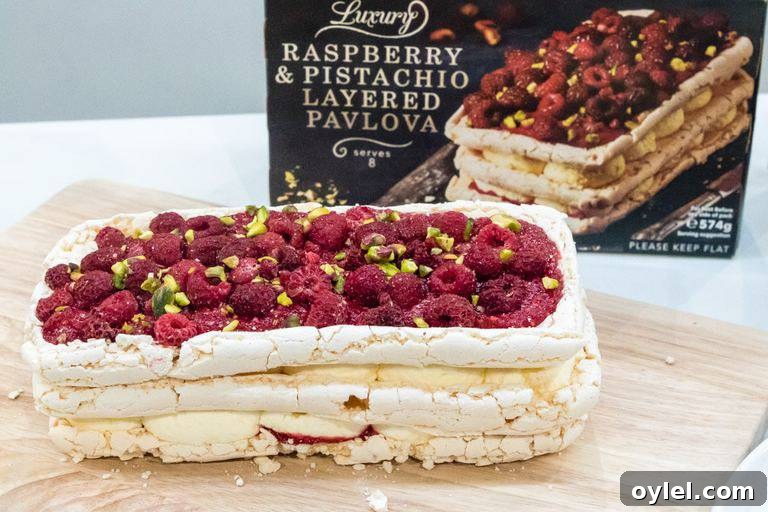 Iceland foods raspberry pistcahio layered pavlova on table