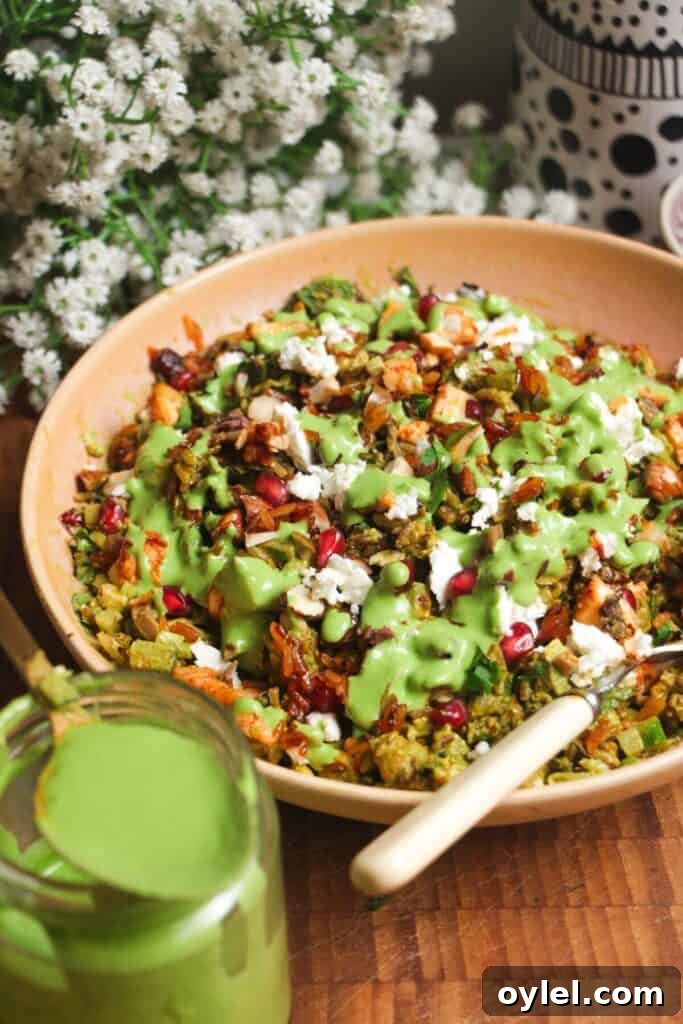 Chicken Shawarma Salad with Crispy Rice 12 Mediterranean crispy rice salad in a pink bowl.