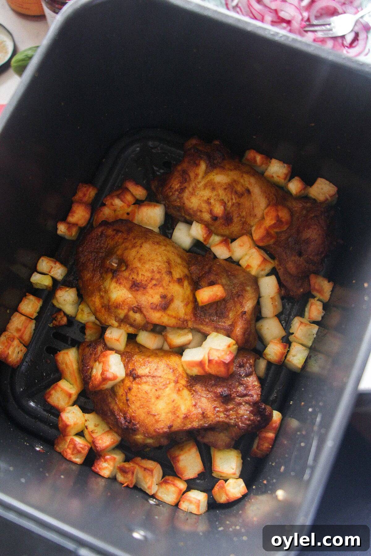 Chicken Shawarma Salad with Crispy Rice 8 Chicken thighs and halloumi cooked in an air fryer basket.