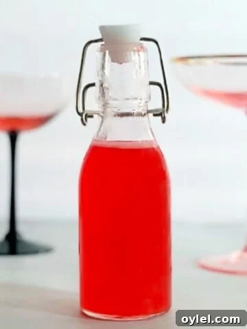 rhubarb syrup in a flip top bottle