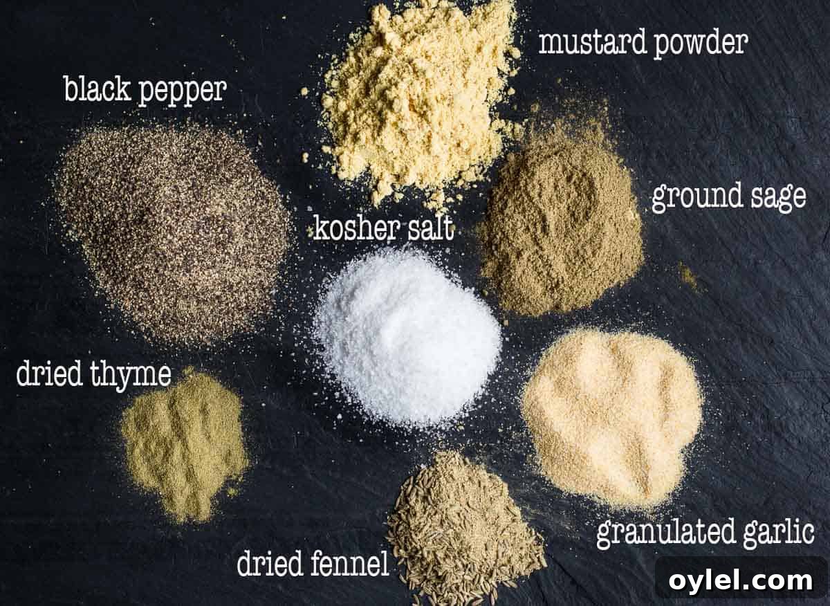 Ingredients for turkey seasoning on a black slate platter with labels