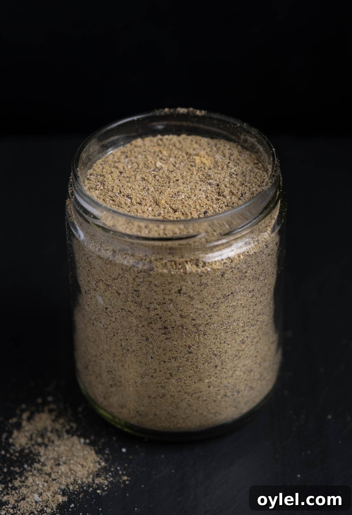 A mason jar with turkey seasoning is the perfect vessel for storing rub.