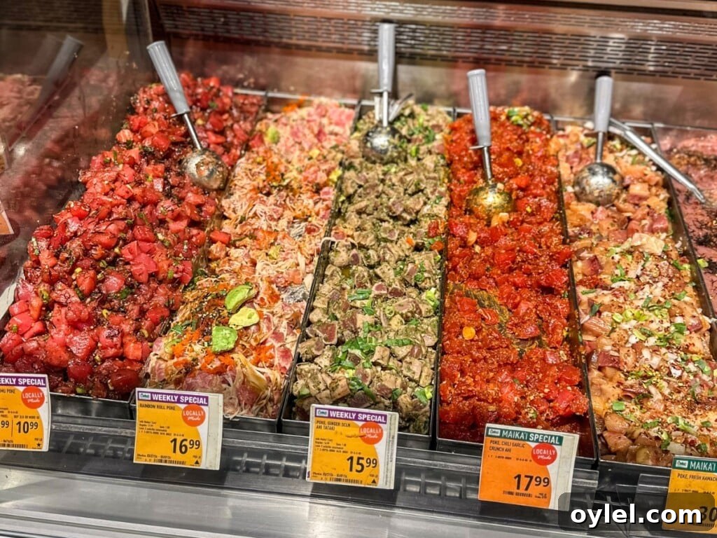 Different types of poke on display at Foodland Waikiki.