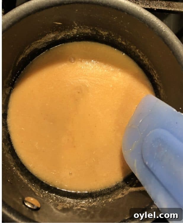 caramel ingredients cooking in a pan