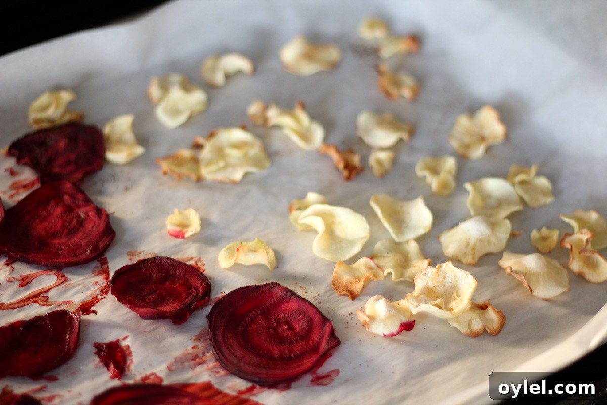 AIP Pomegranate Guacamole - a delicious and healthy holiday appetizer that you can serve with your favorite chips! It's great with veggie chips or plantain chips! | fedandfulfilled.com