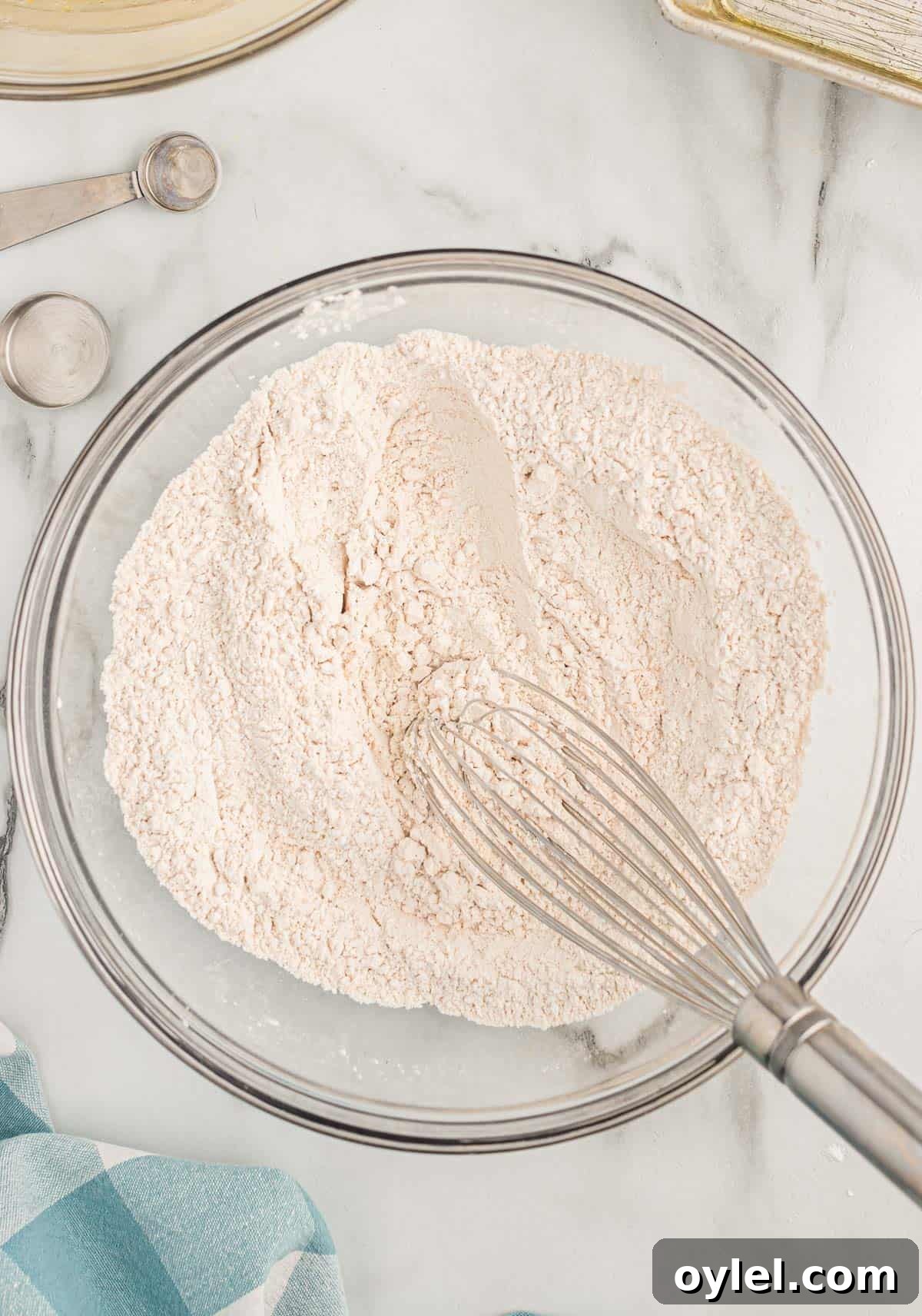 Classic Moist Homemade Banana Bread Recipe 9 dry ingredients whisked together in a bowl