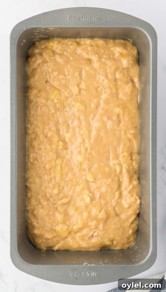 Classic Moist Homemade Banana Bread Recipe 11 banana bread batter in a loaf pan