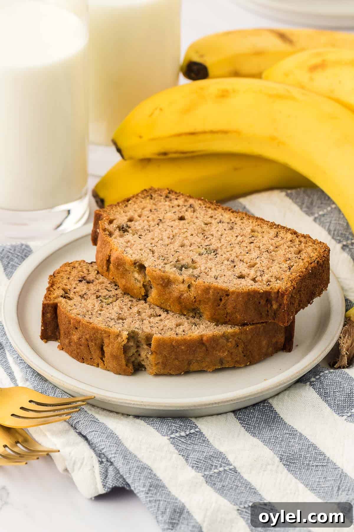Classic Moist Homemade Banana Bread Recipe 14 two pieces of banana bread