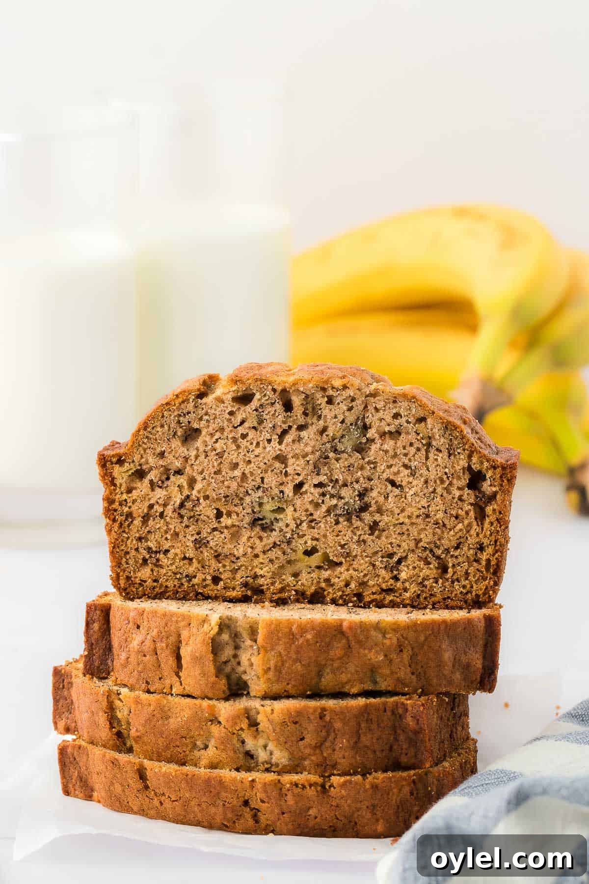 Classic Moist Homemade Banana Bread Recipe 4 banana bread slices stacked
