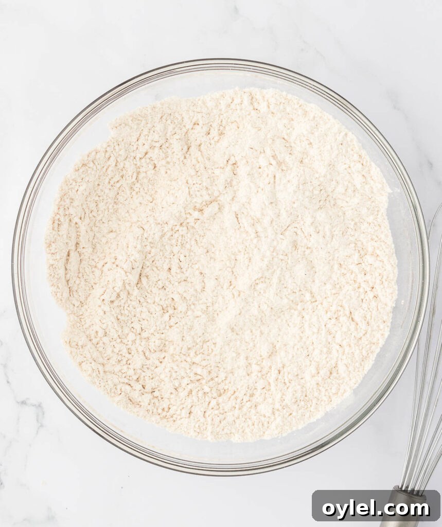 Classic Moist Homemade Banana Bread Recipe 8 dry ingredients mixed together in a bowl