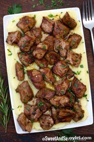garlic butter steak bites with mashed potatoes